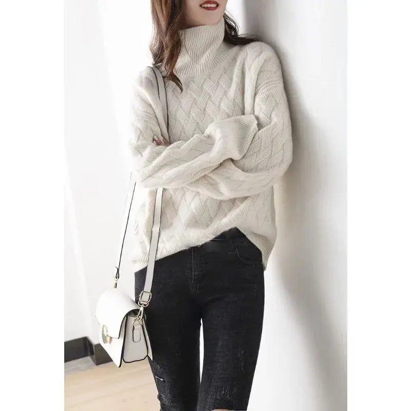 Cream oversized turtleneck sweater with diamond cable knit and straight hem