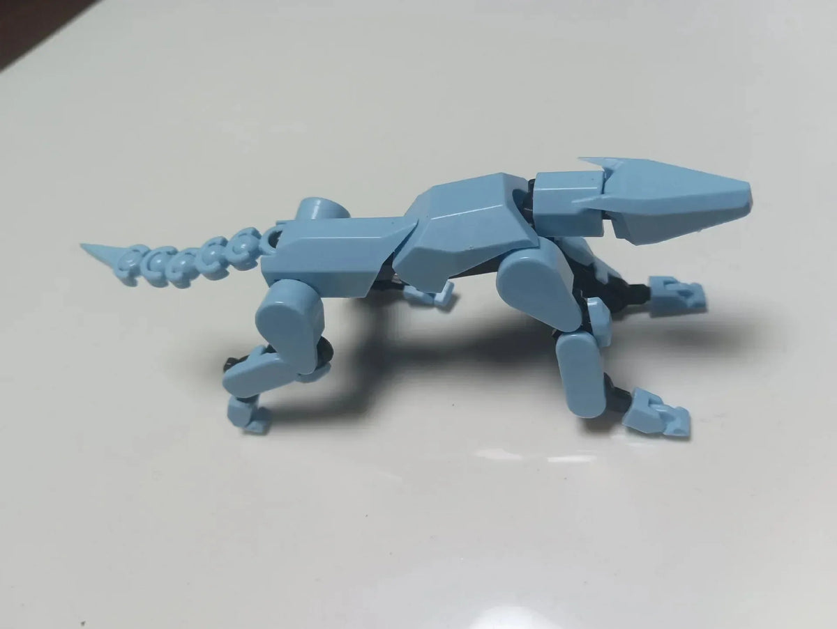 Blue multi-jointed robot animal-like figure with poseable legs and tail