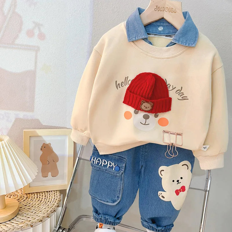 Beige sweatshirt with red beanie bear graphic and blue denim jogger pants set