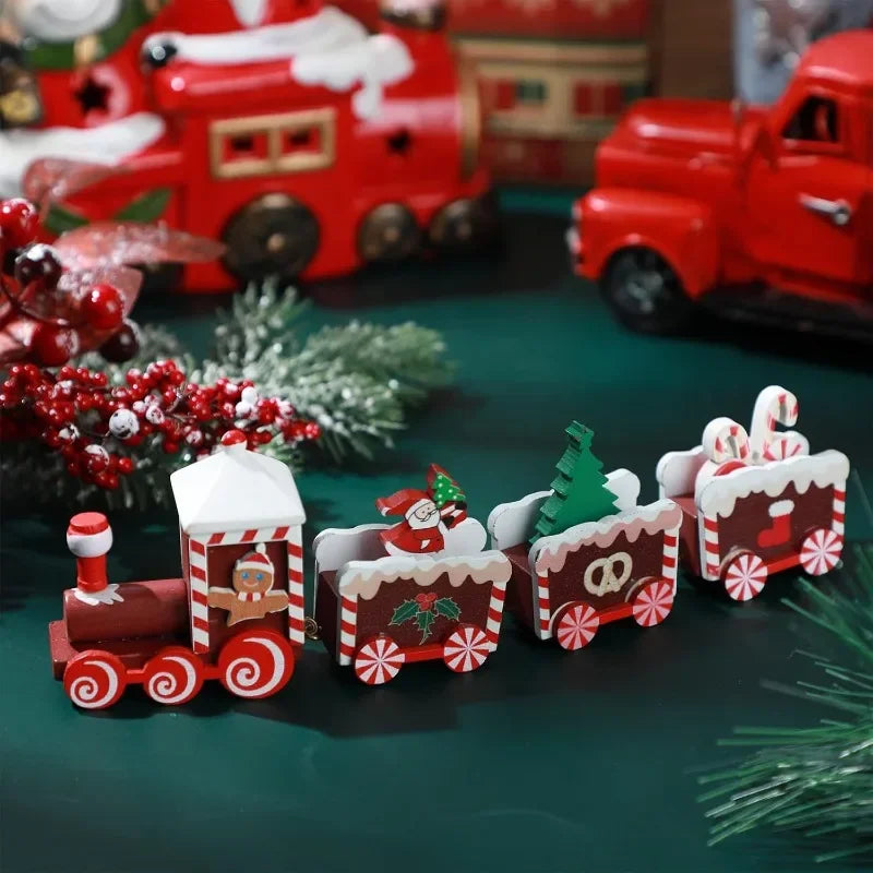 Painted wooden Christmas train set with red cars, candy cane stripes, and small tree