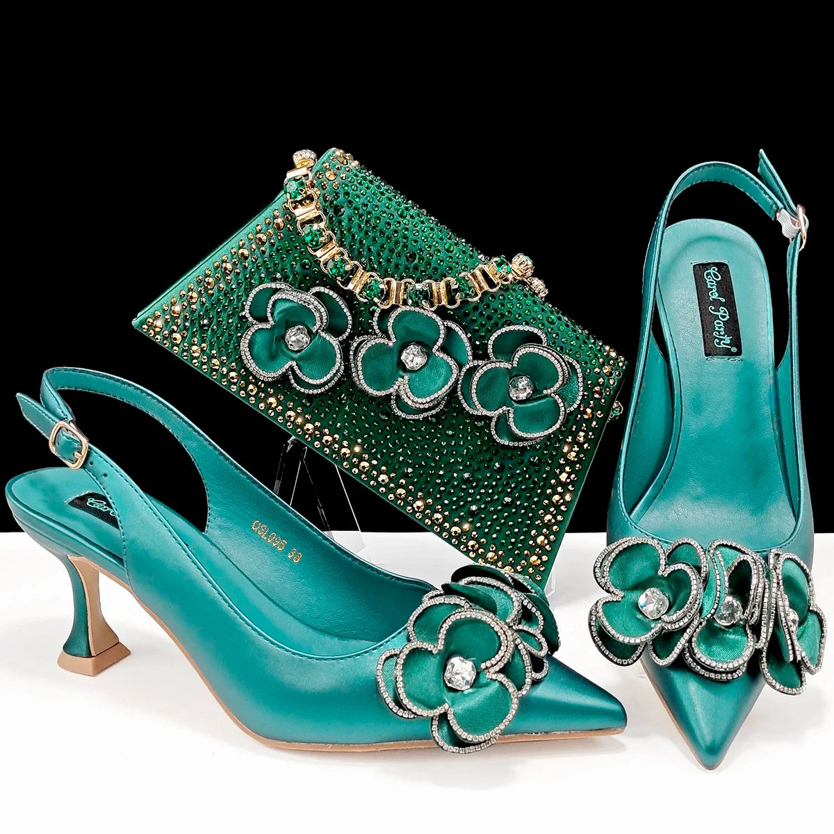 Ladies shoes and matching beaded set with turquoise flats and clutch with floral accents