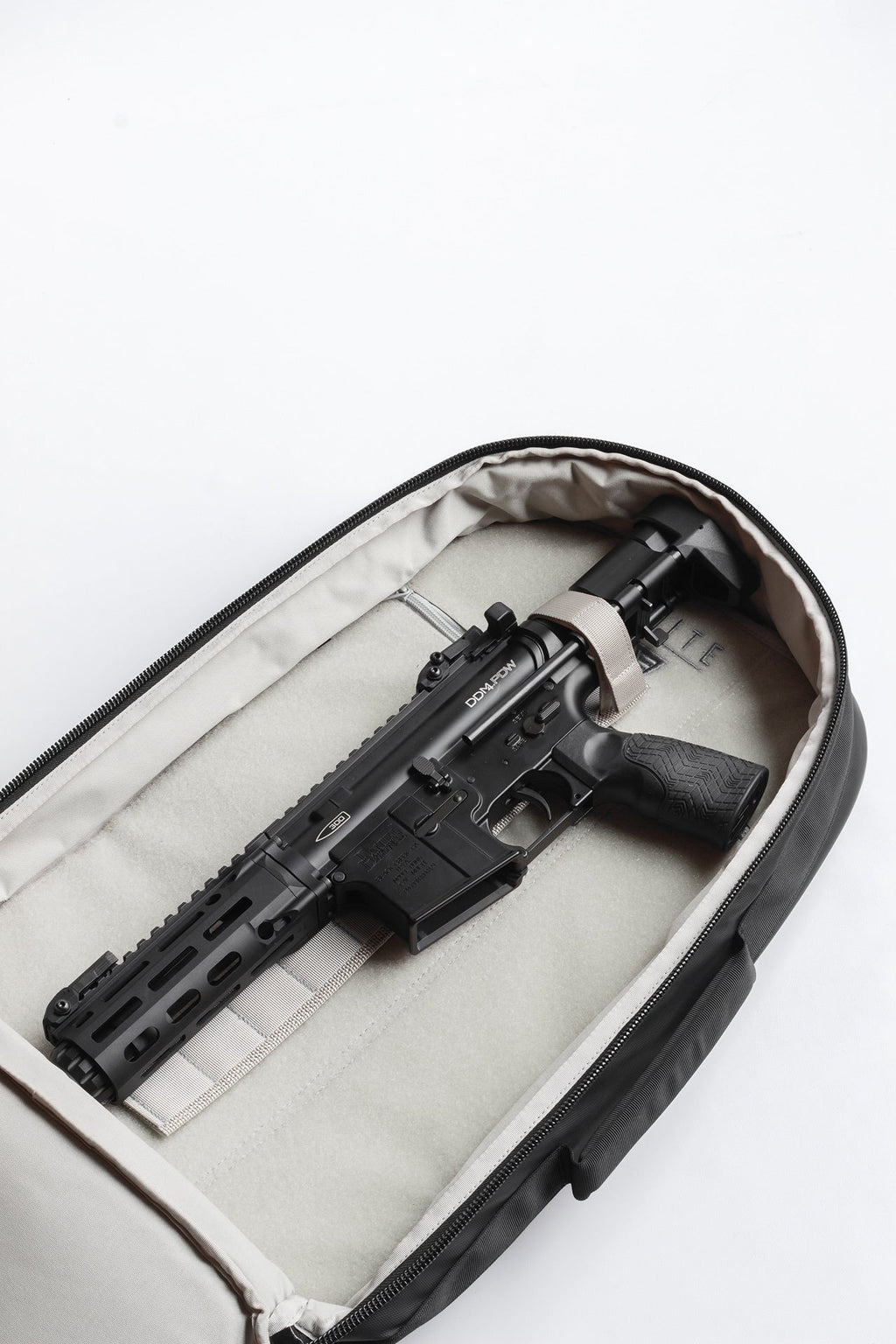 Tactical backpack, open top, padded interior with black insert and secure straps