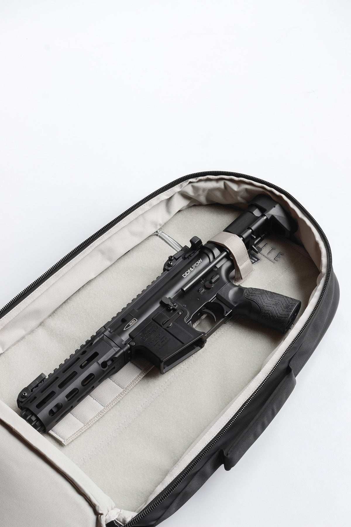 Tactical backpack, open top, padded interior with black insert and secure straps