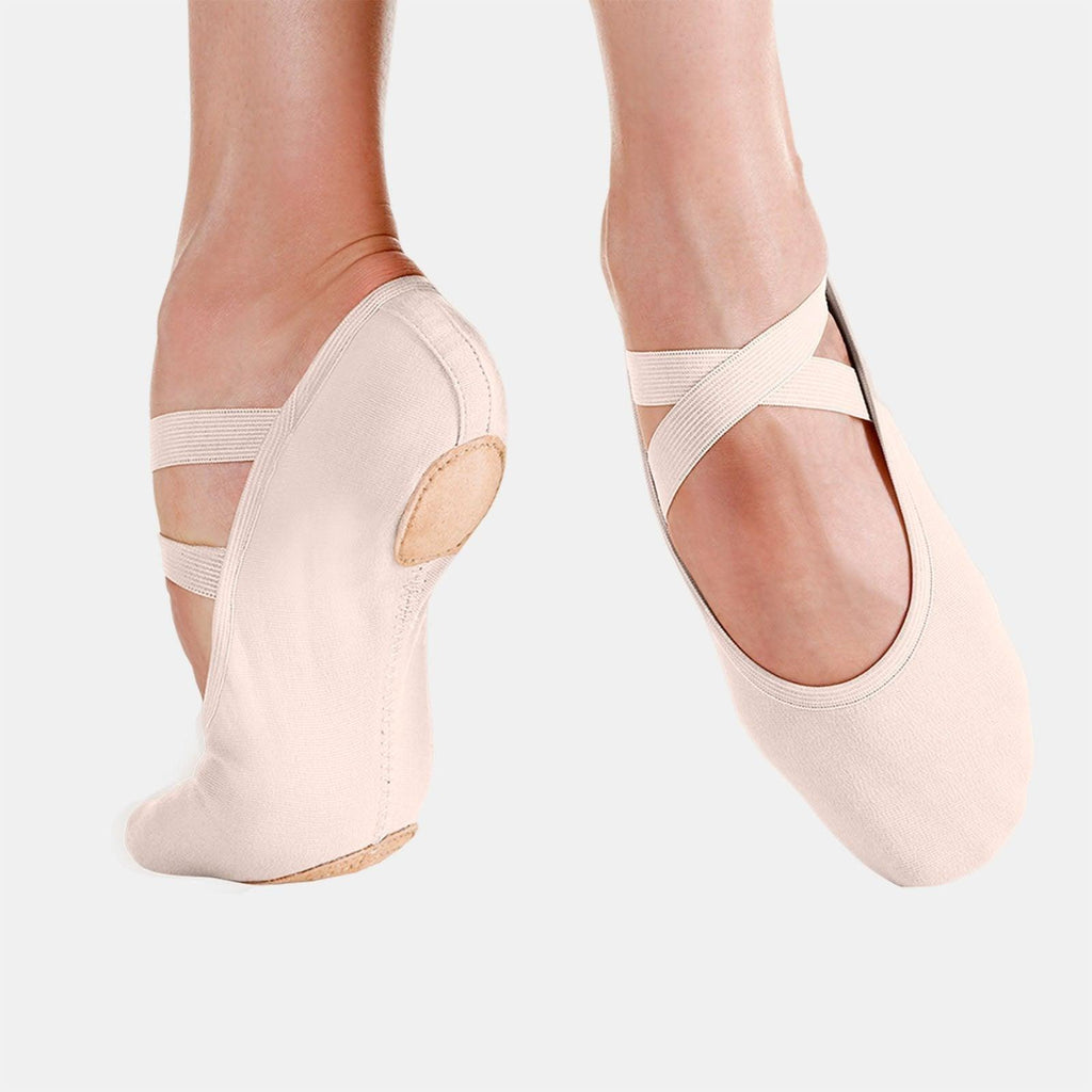 Adult pale pink canvas ballet shoes with elastic strap across instep