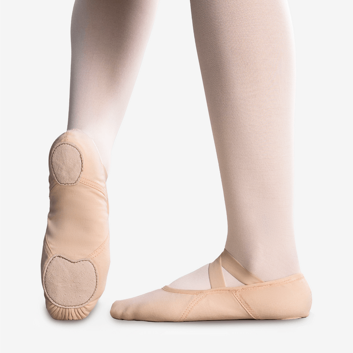 Light pink ballet shoe with rounded toe and heel pads, elastic strap and split sole