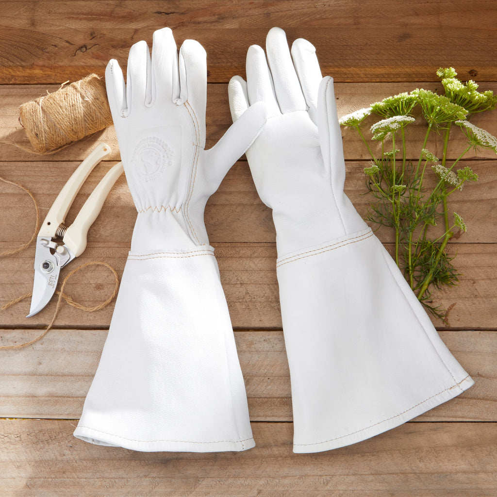 White goatskin gauntlet gloves, stitched cuffs and finger panels, pair view
