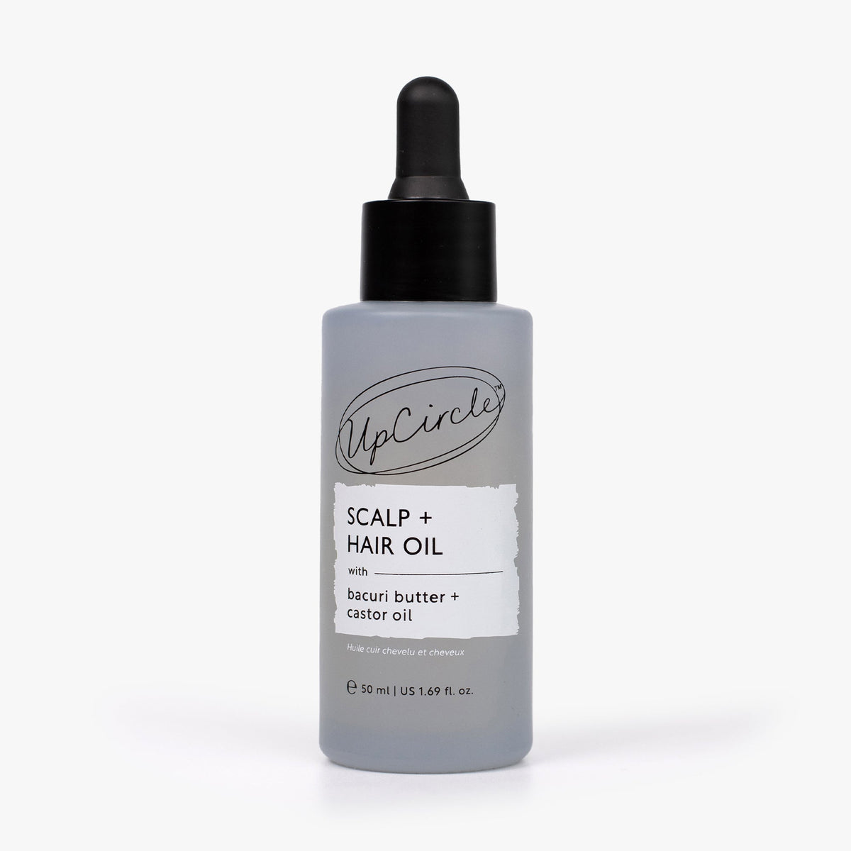 Scalp and hair oil bottle with black dropper, light lavender container