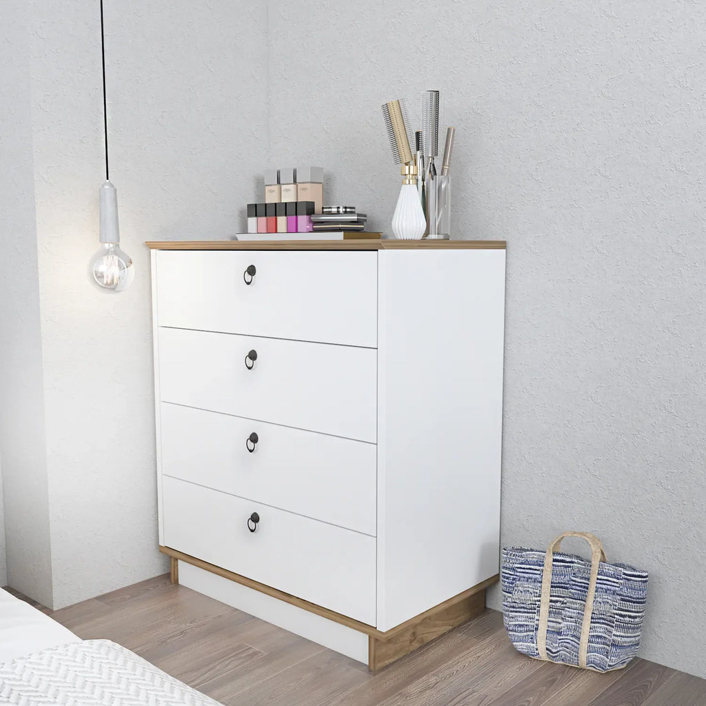 White dresser with four drawers, light wood top, black oval handles