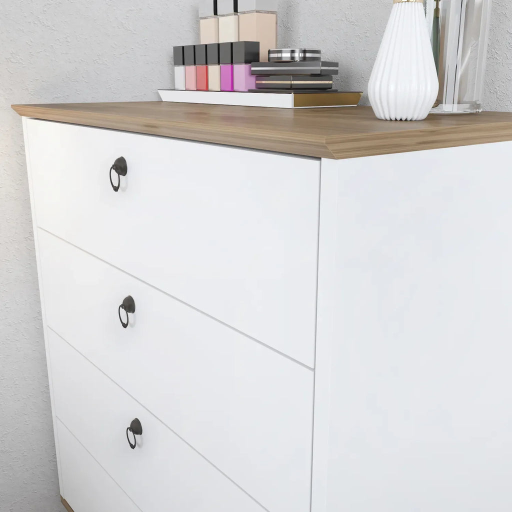 White dresser side with three drawers, wood top, black oval handles
