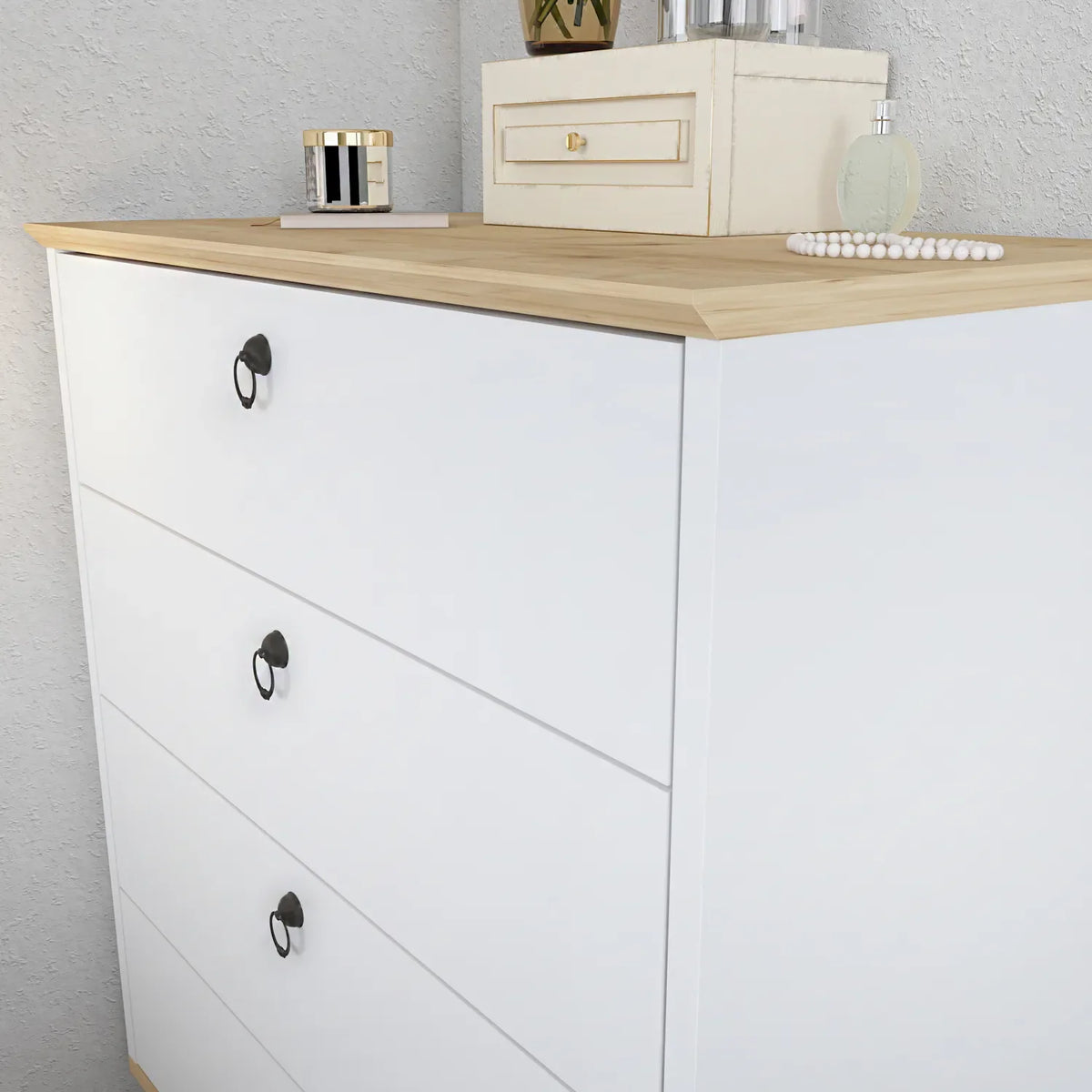White dresser with wood top, three drawer fronts, black oval pulls