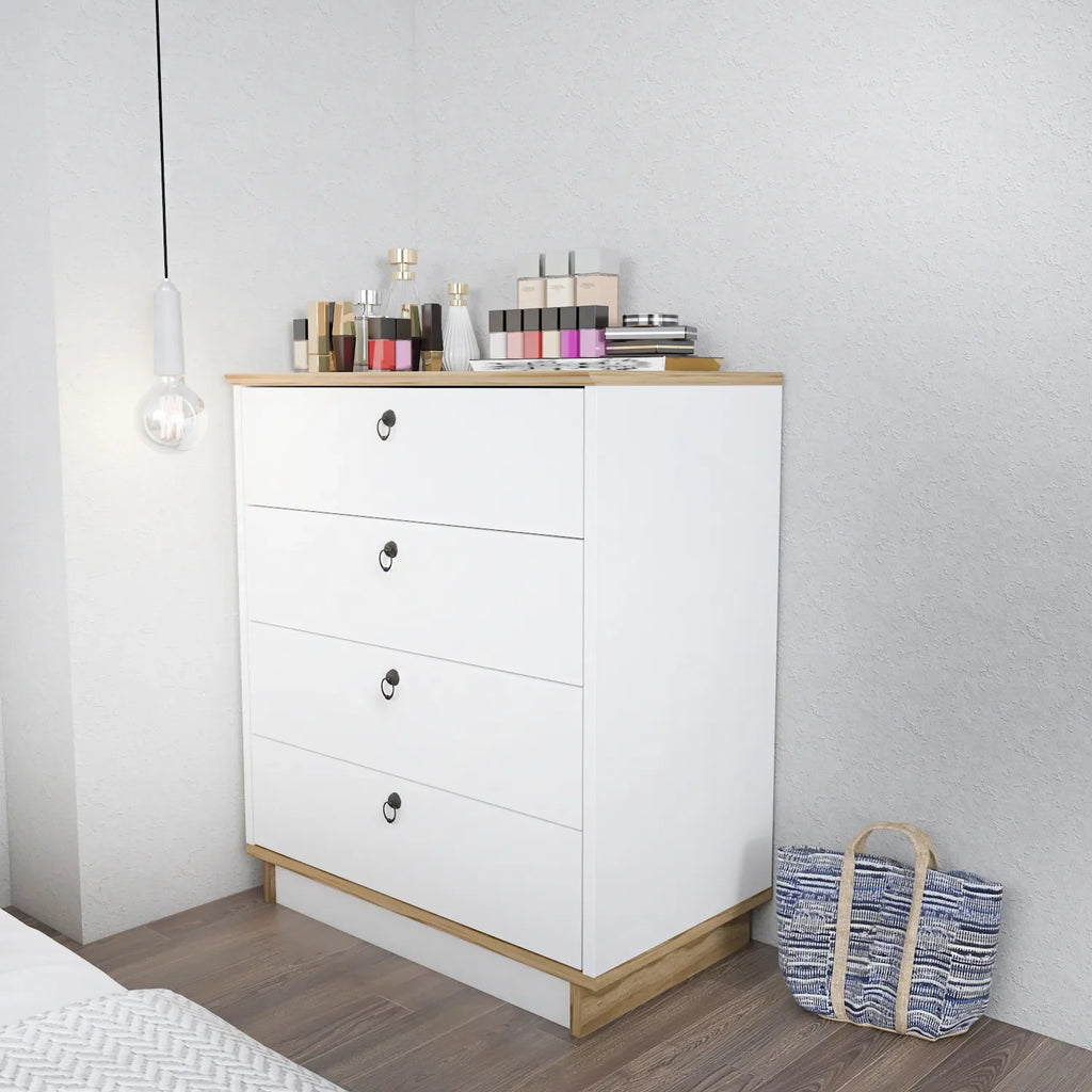 Modern white dresser, light wood top and legs, four drawers with black pulls.
