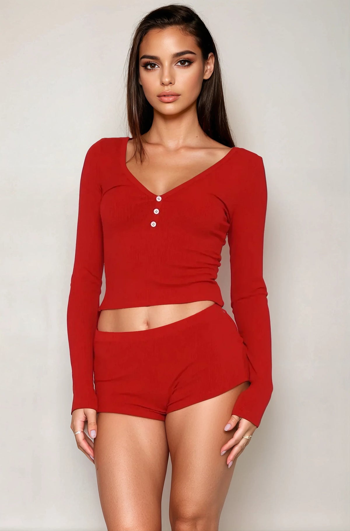 Red V-neck button long-sleeve crop top with matching shorts set