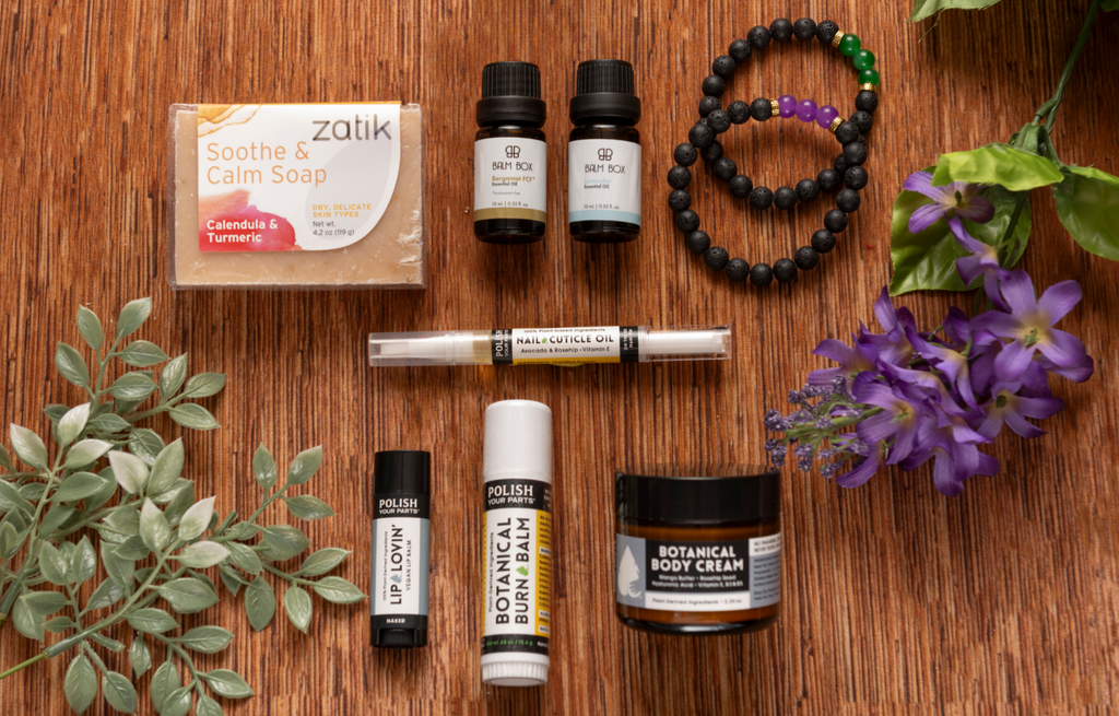 Soothing skin and lips care assortment with soap, oils, balm, and body cream