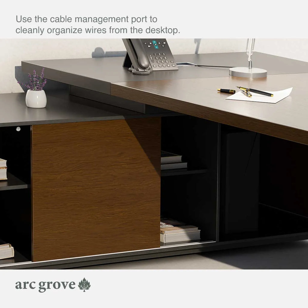 Dark oak desk with cable management port on gray desktop