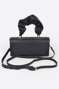 Black wrinkled-handle flap clutch with shoulder strap and gold-tone hardware