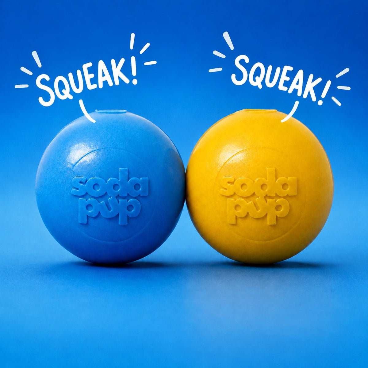 Squeaky dog ball set, blue and yellow round rubber balls with Soda Pup embossed logo