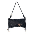 Black embroidered shoulder bag with starfish clasp and braided tassel ties