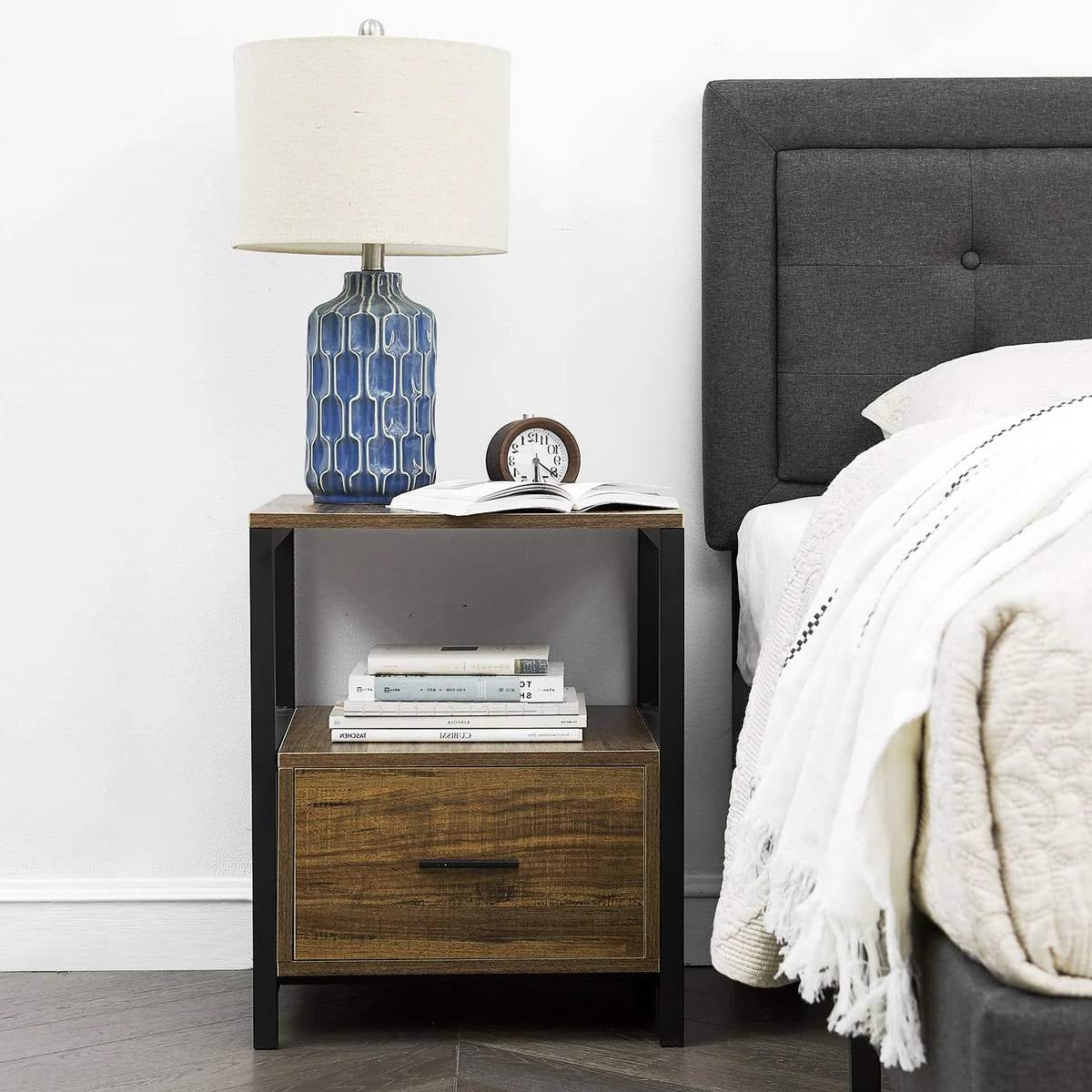 Nightstand with wood finish, open shelf, and storage drawer with dark metal frame