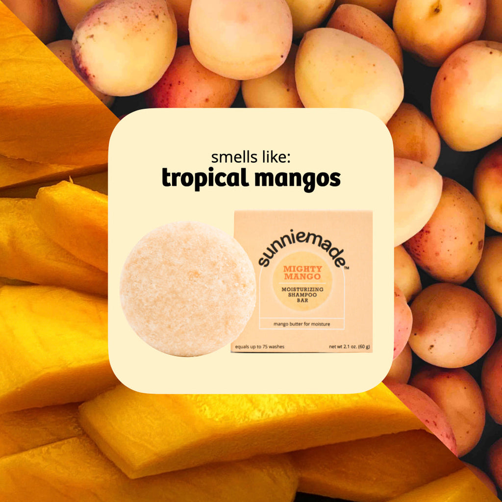 Moisturizing shampoo bar with Mighty Mango box beside whole mango fruit