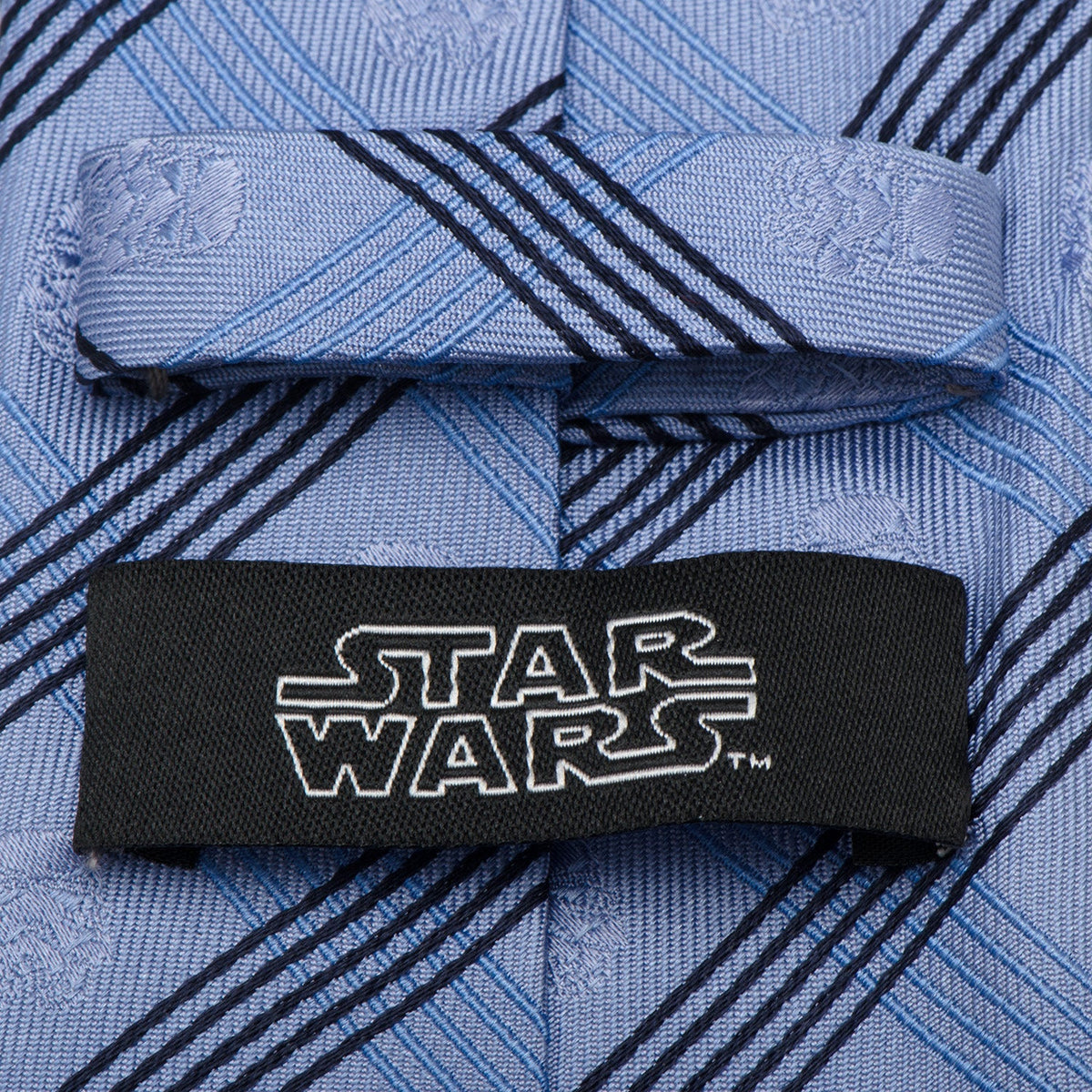 Light blue plaid necktie with black diagonal stripes and Star Wars logo tag