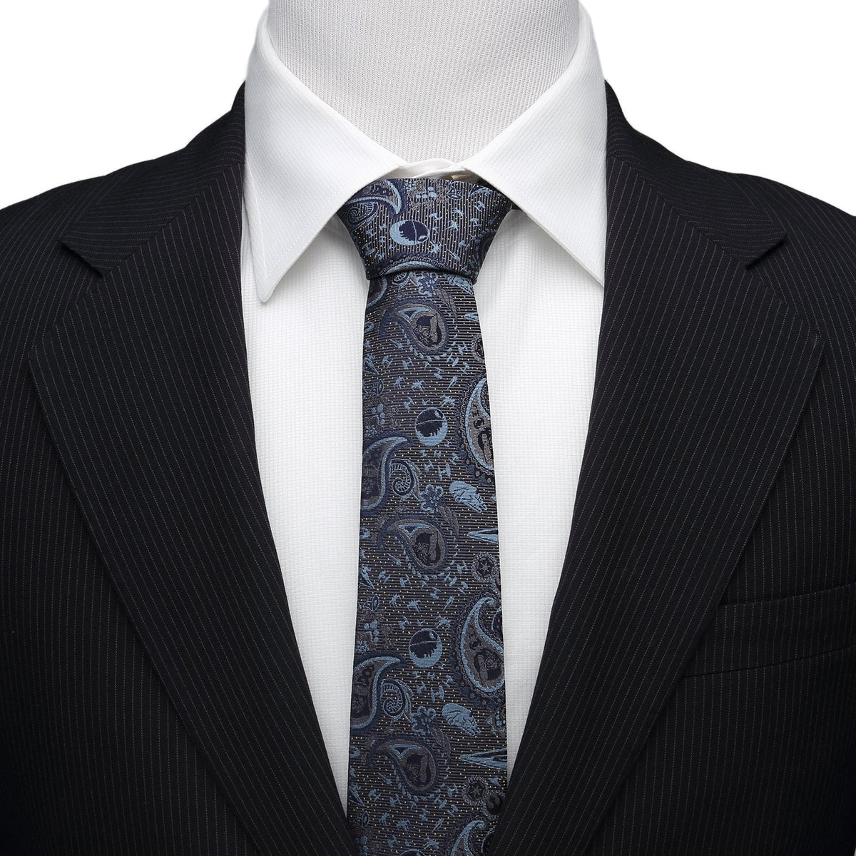 Paisley necktie in blue and gray on a white dress shirt