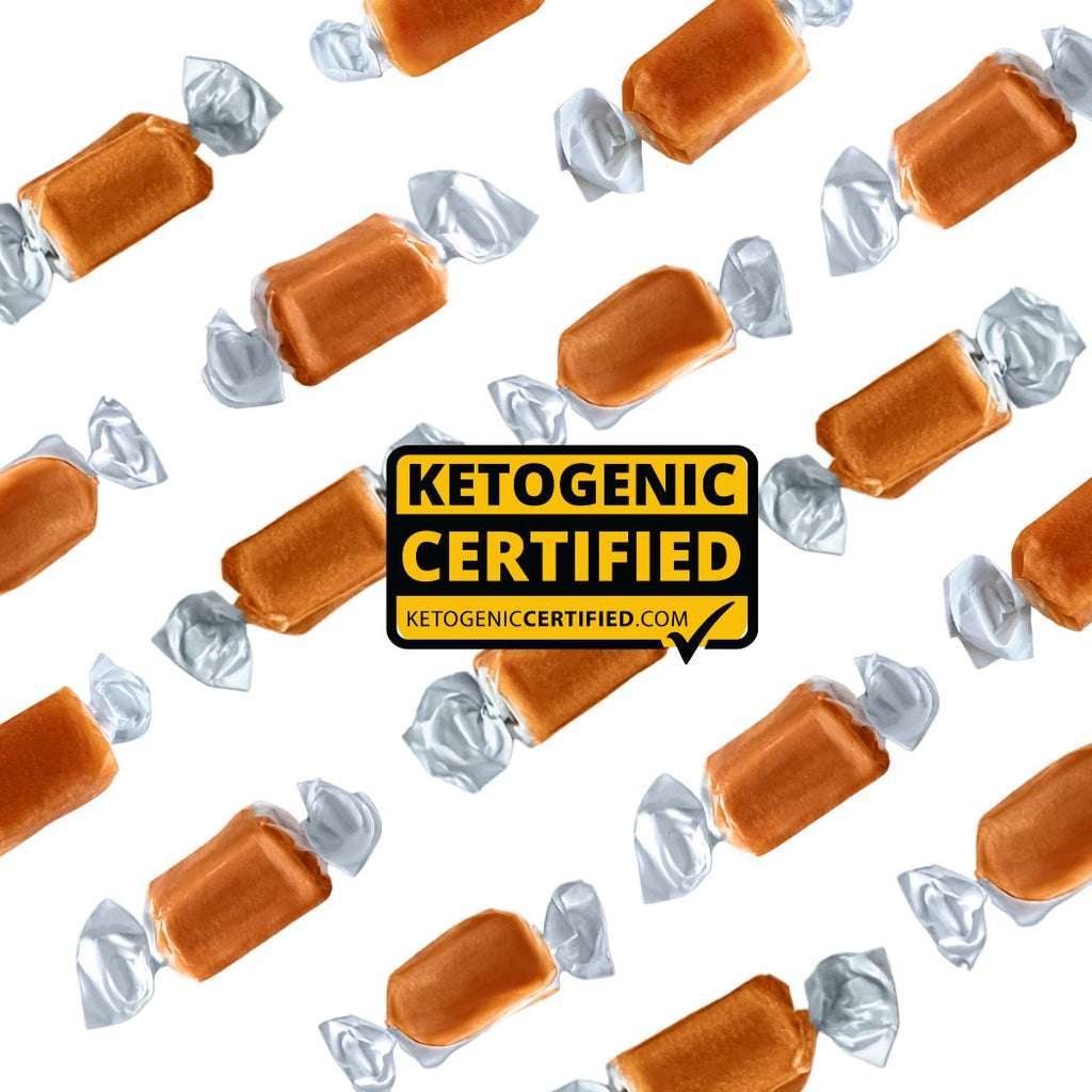 Keto certified coffee caramel candies with silver-wrapped pieces scattered