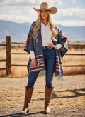 Reversible southwest shawl wrap in blue jean tones with geometric pattern and fringe