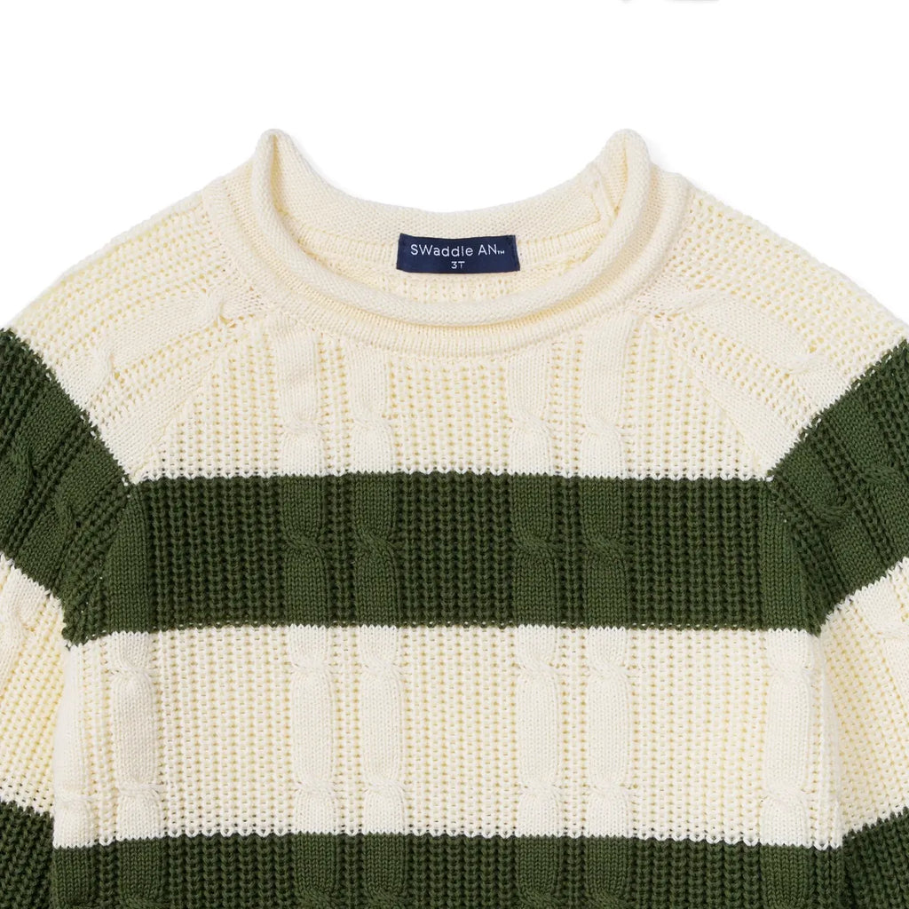 Cable knit roll neck sweater close-up, cream with dark green stripe bands