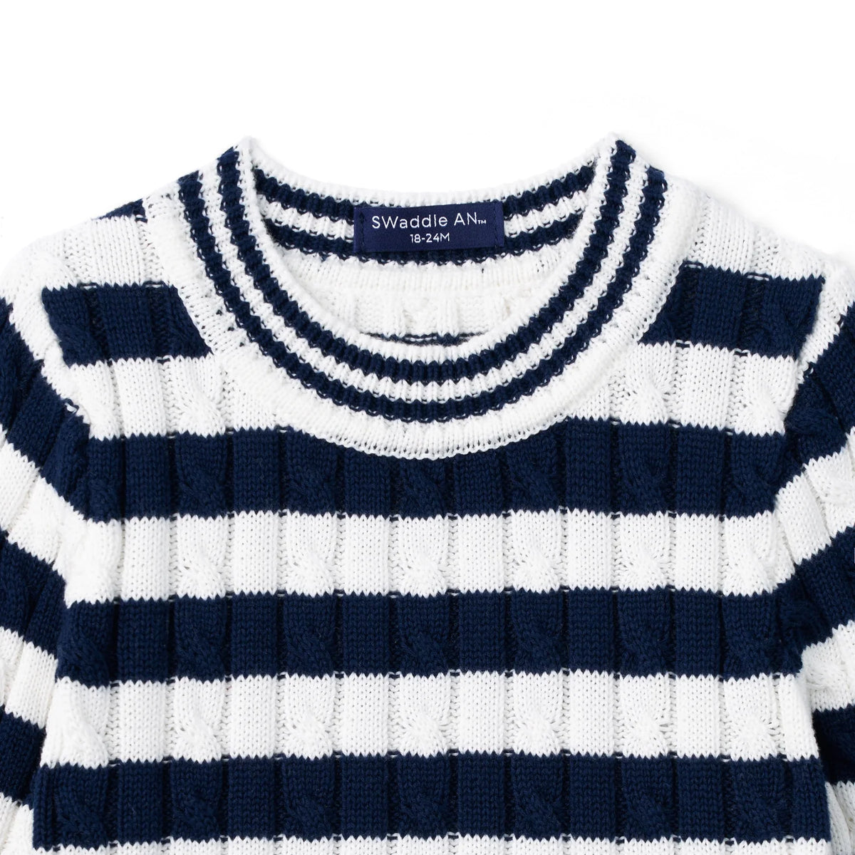 Kids striped crew-neck sweater close-up, navy-and-white ribbed collar and knit texture