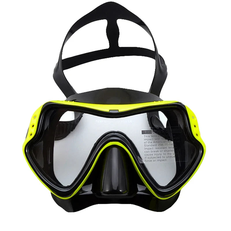 Black scuba diving mask goggles with neon yellow trim, clear lenses and adjustable head strap.