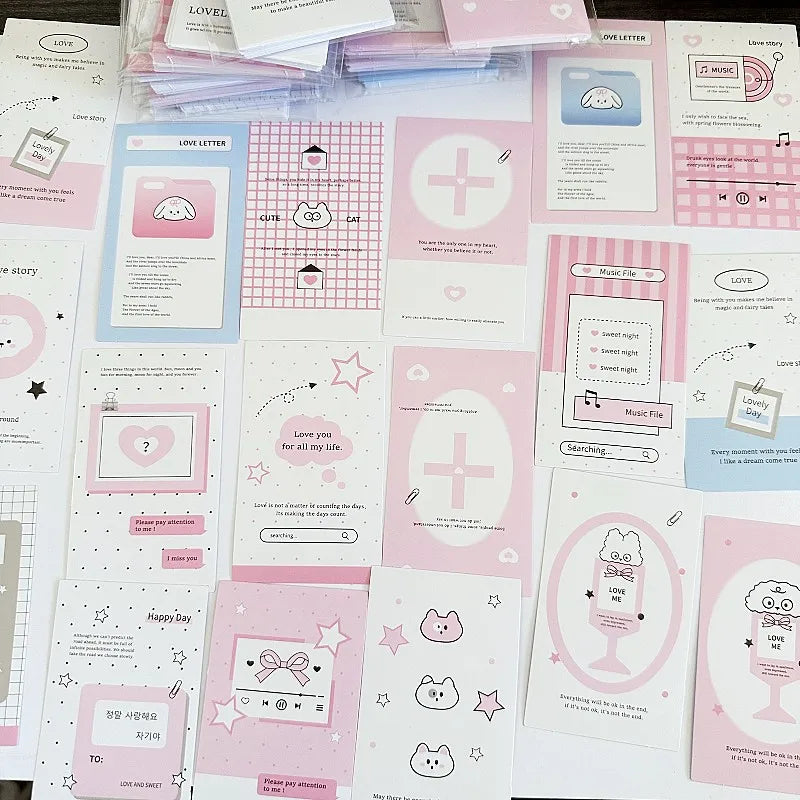 Flat lay of pink and white seal stickers with heart, star, cross, and animal icons