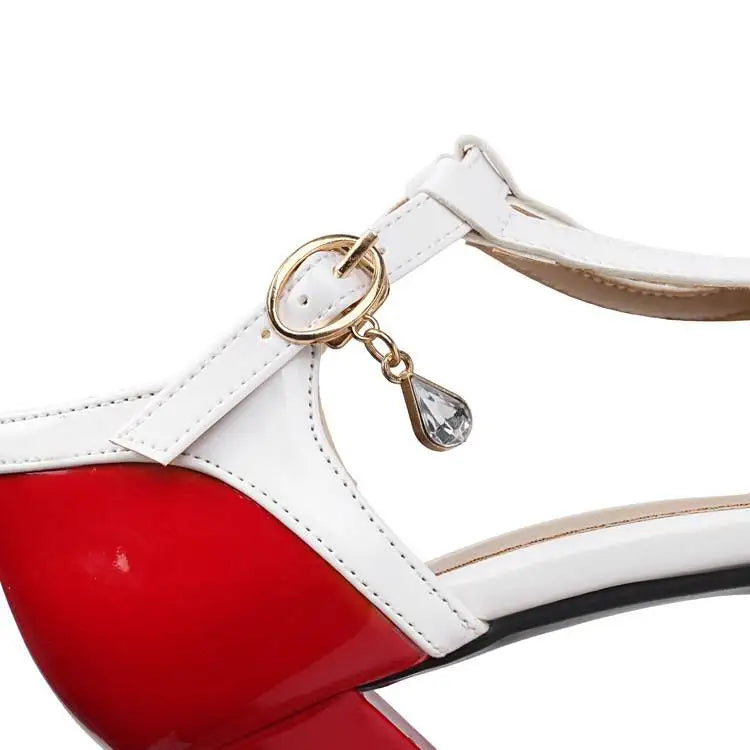 White strap high-heel shoe with gold-tone buckle ring and dangling charm
