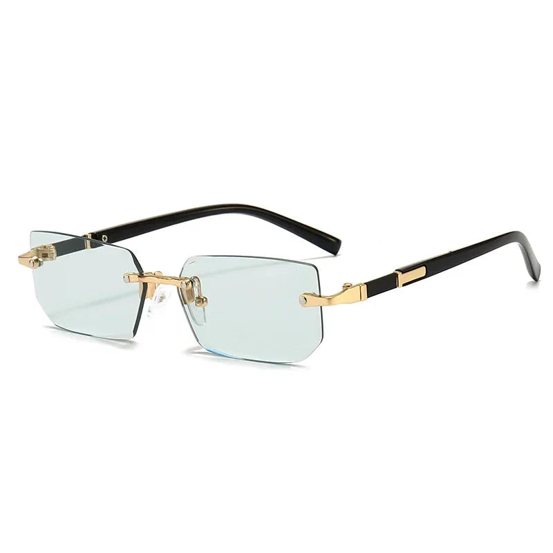 Rimless square sunglasses with light mint lenses, black frame arms, and gold accents.