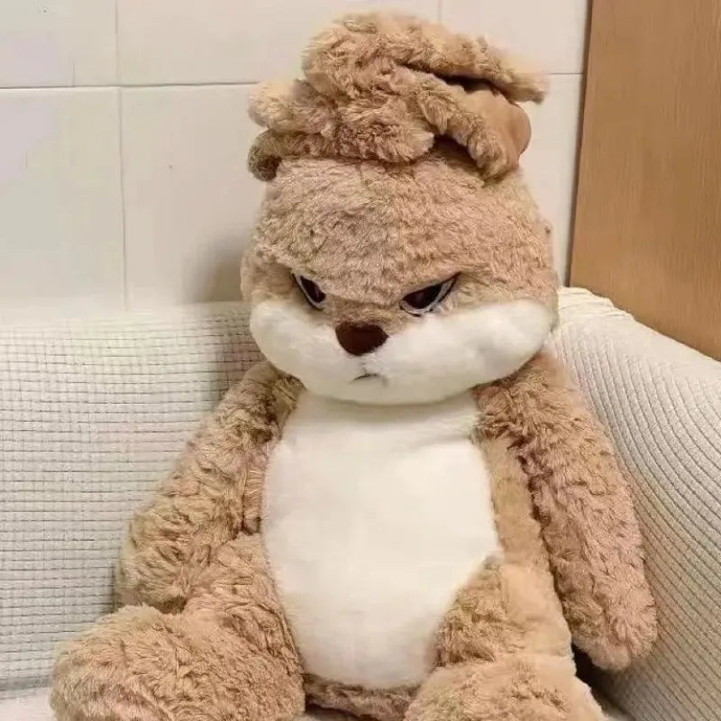 Angry long-eared rabbit plush sitting, fluffy tan ears and white belly