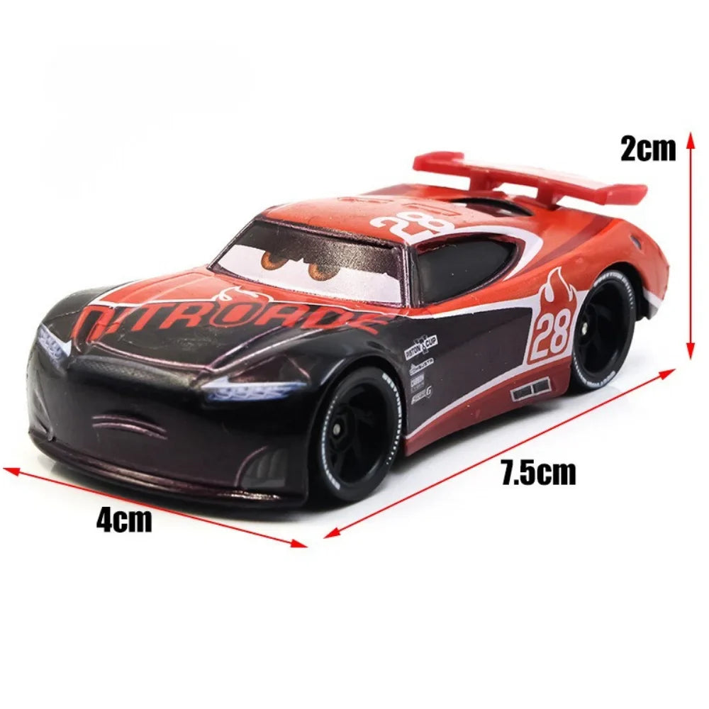 Red and black diecast racing car toy with flame graphics, front three-quarter view.