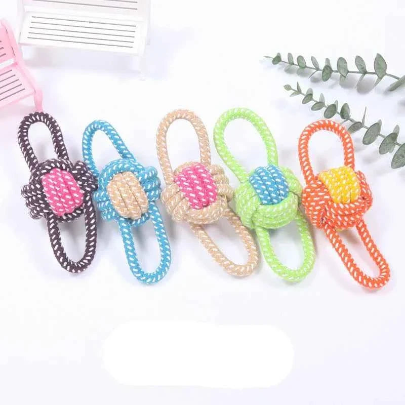 Set of braided dog rope toys with loop handles and knotted ball centers, assorted colors