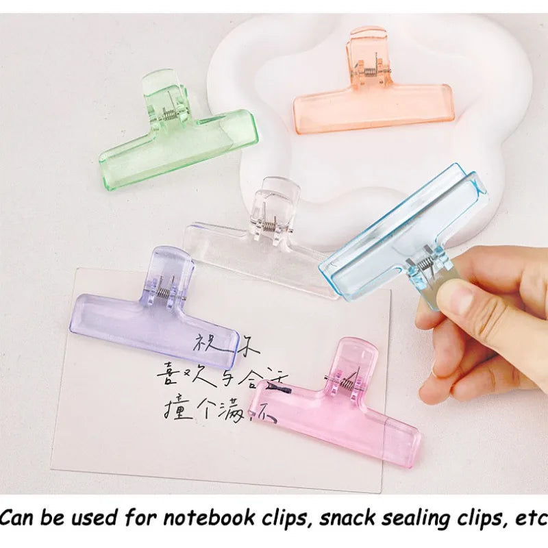 Assorted ice jelly clips laid out: green, peach, blue, clear, lavender, pink