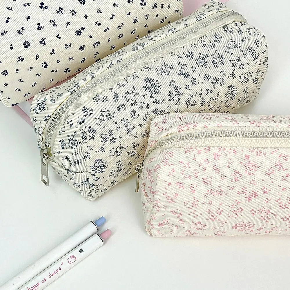Large canvas pencil pouch with zipper, cream base and small navy floral pattern
