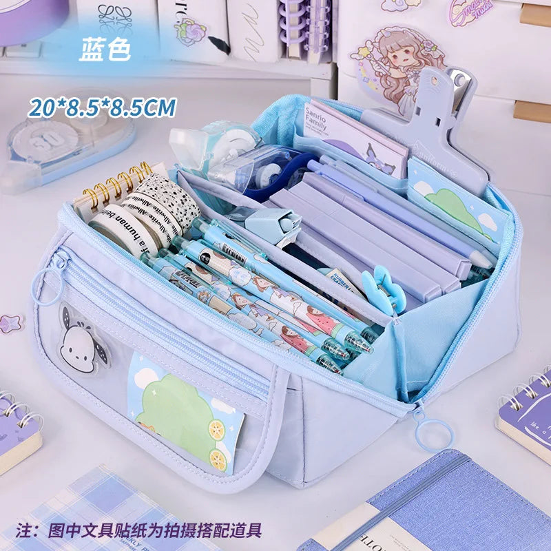 Light blue zip pencil case open with pens and markers in organizer compartments