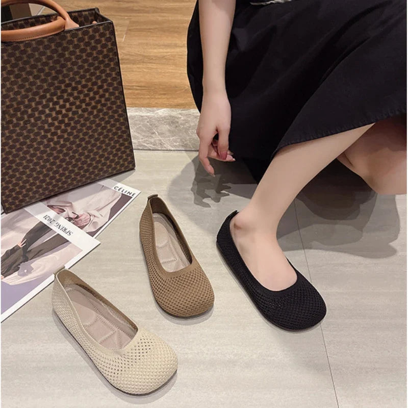 Women’s slip-on knit flats in beige and black, rounded toe, low profile