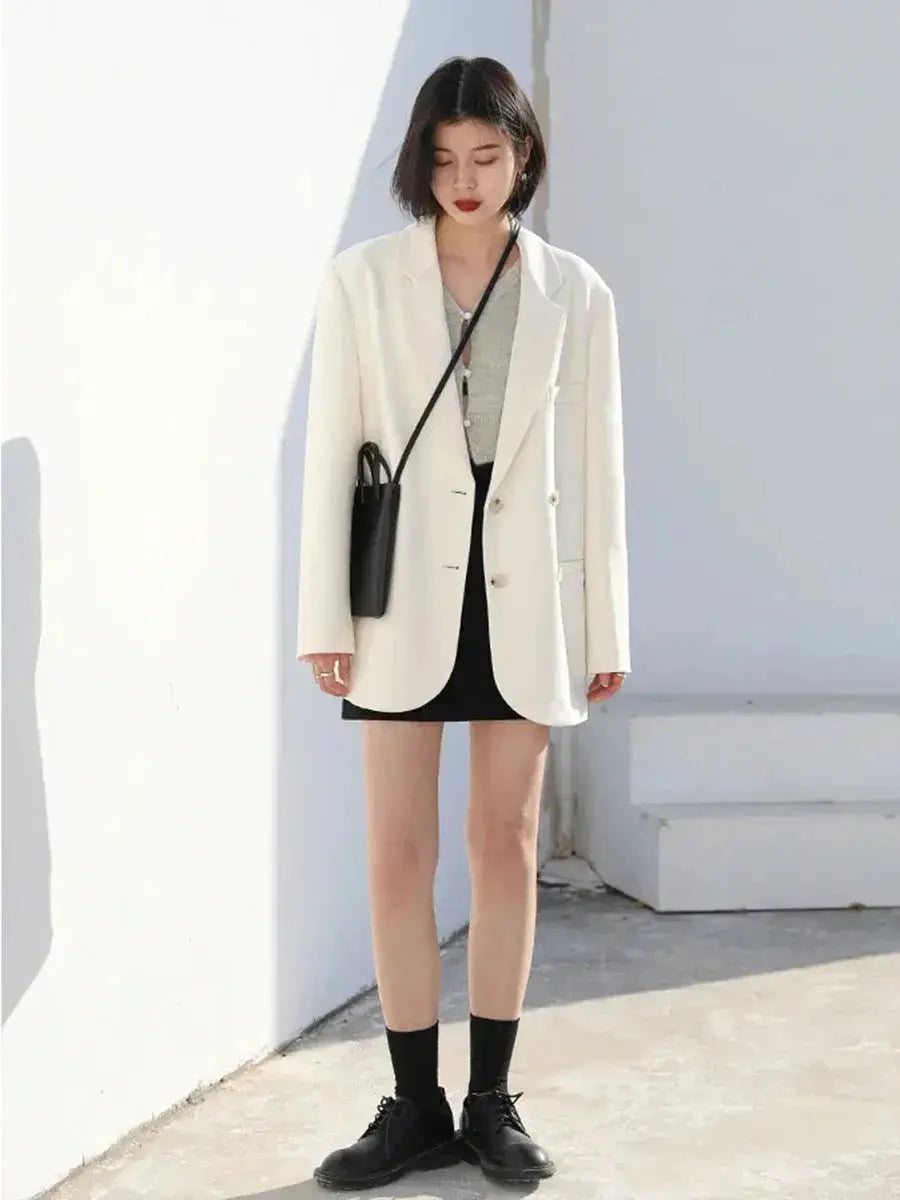 Ivory solid long-sleeve coat with double-breasted buttons and notched lapels