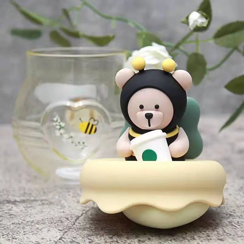 Glass tea infuser mug with bear character lid and honey pot-style infuser