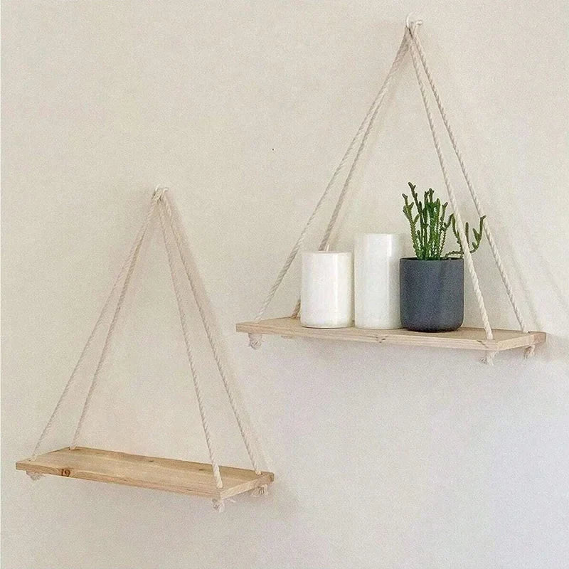 Hanging hemp-rope wooden shelves with candles and potted herbs, two shelf levels