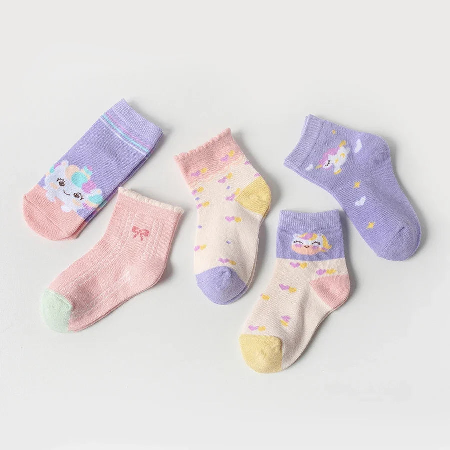 Set of five kids mid-calf socks in lavender, pink, and cream with unicorn and star patterns.