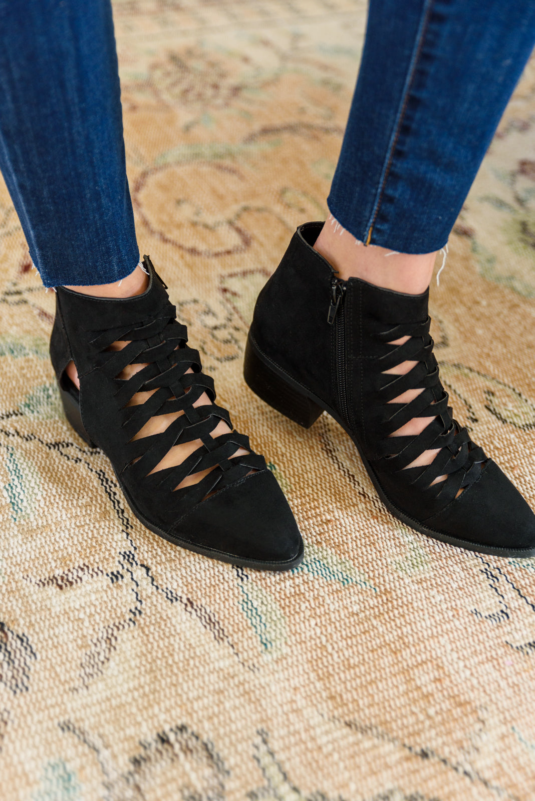 Black lace-up ankle boots with block heel and cutout laces