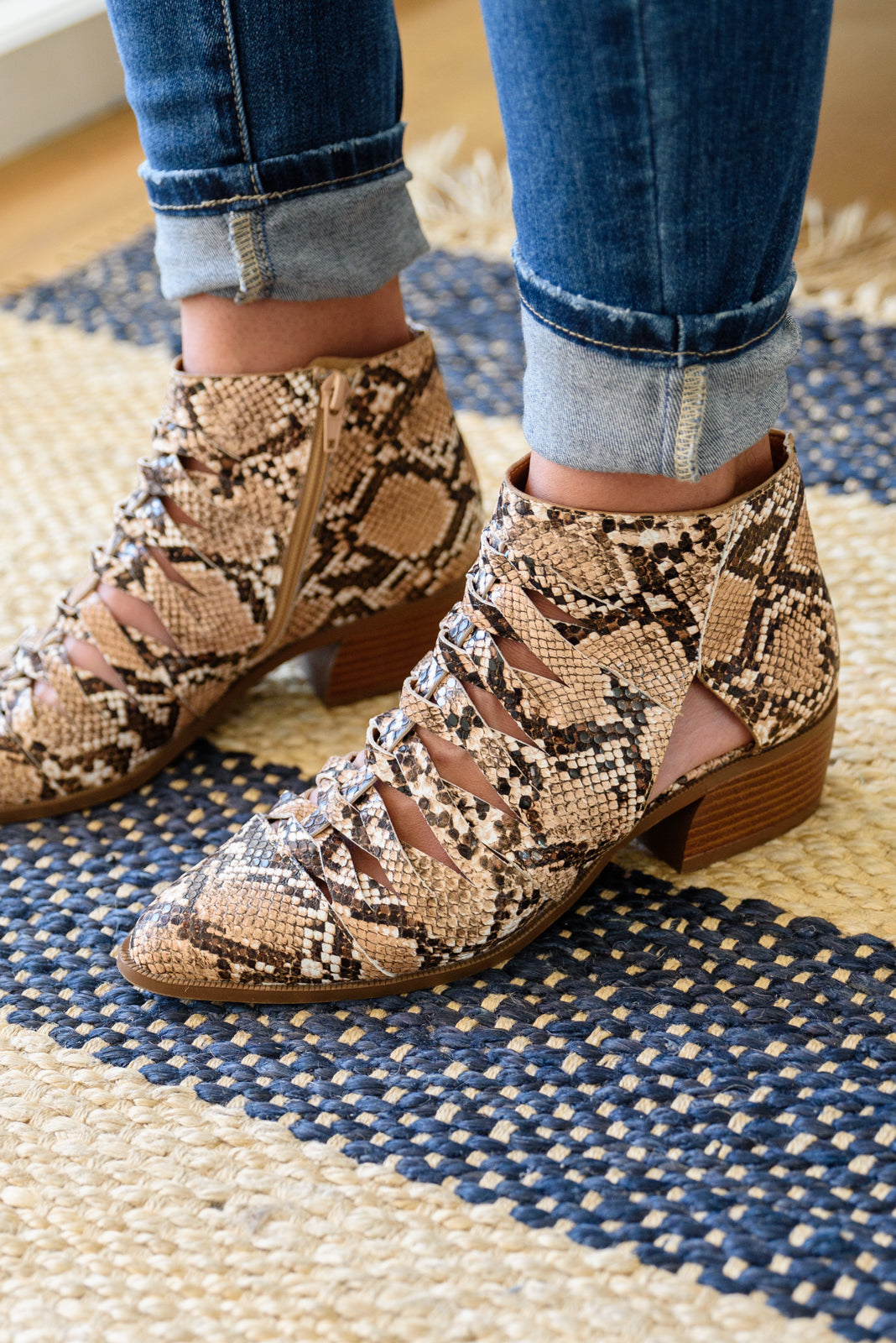 Snakeskin-print ankle boots with lace-up front and stacked brown block heel