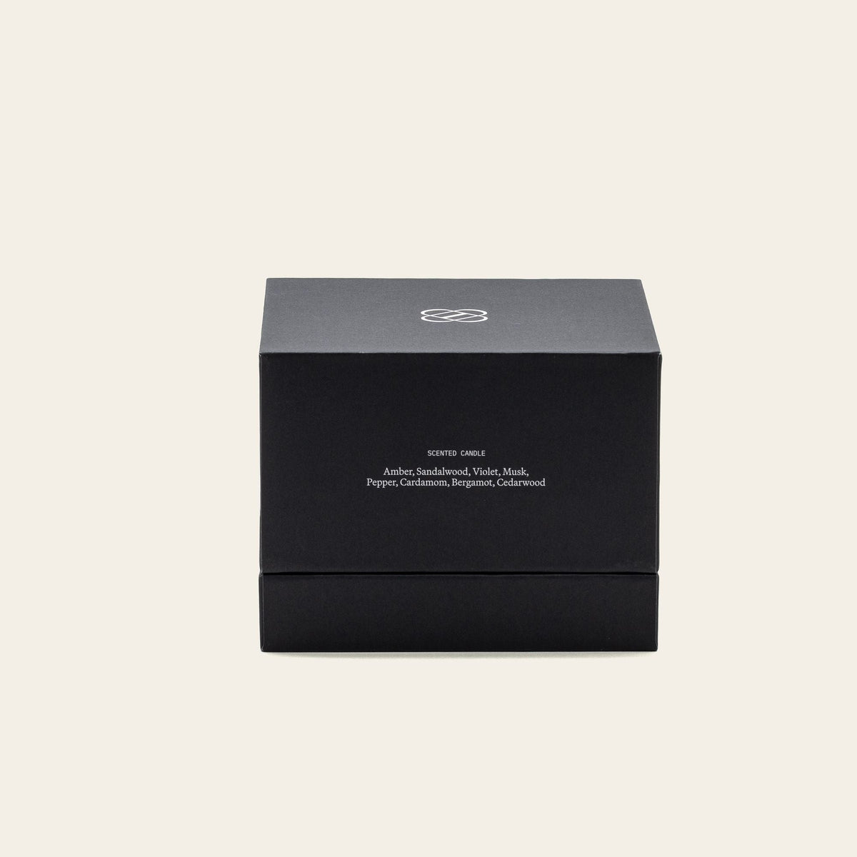 Santal Noir soy wax candle box, dark charcoal with scent details on front