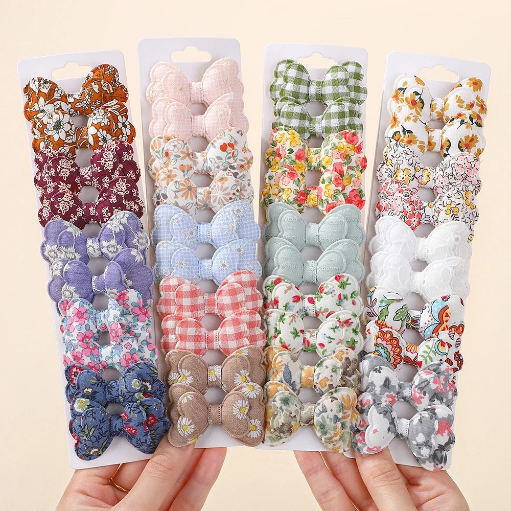 Set of 10 baby cotton bowknot hair clips with assorted patterned bows