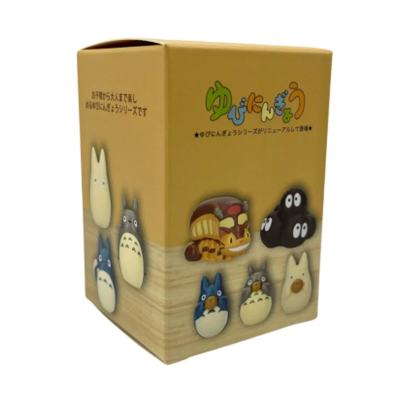 Brown blind box display cube with character artwork on the side