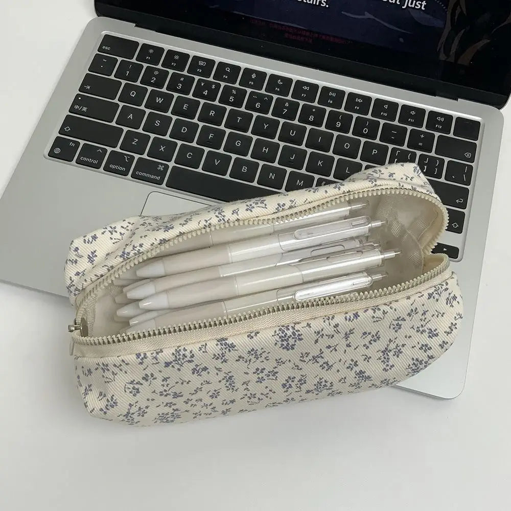 Large canvas pencil pouch with zipper, cream base and navy micro-floral print